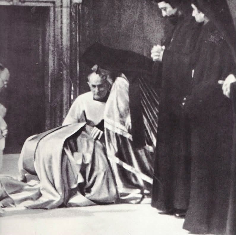 Paul VI kneels before Metropolitan Meliton, Sistine Chapel, December 14, 1975